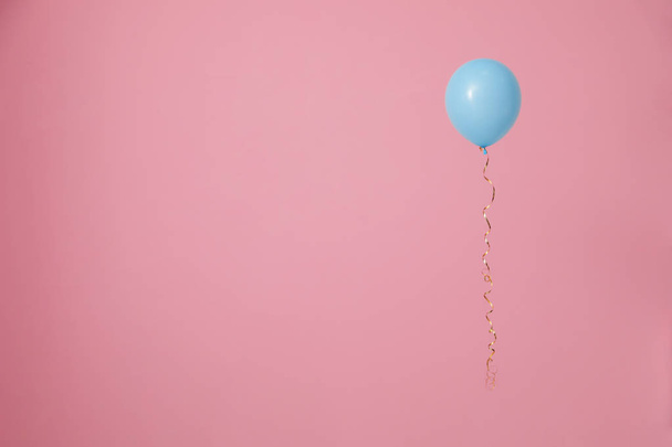 Bright balloon on color background, space for text. Celebration time - Fotoğraf, Görsel
