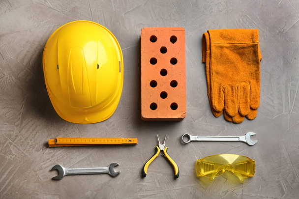 Flat lay composition with different construction tools on color background - Photo, image