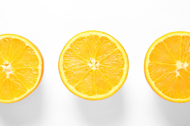 Juicy oranges on white background, top view - Photo, image