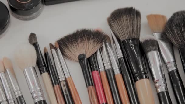A set of brushes for makeup on the table makeup artist. - Footage, Video