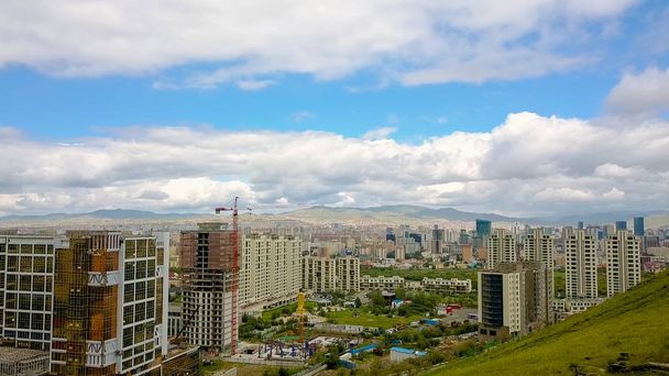 Mongolia, Ulaanbaatar Panorama of the city from a bird s-eye view in cloudy weather. Landing, From Drone  - Photo, Image