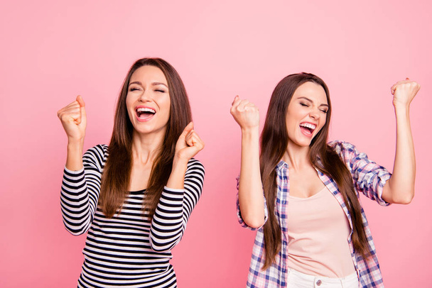 Portrait of nice-looking attractive lovely cute charming winsome cheerful cheery overjoyed straight-haired girls having fun holiday isolated over pink pastel background - 写真・画像