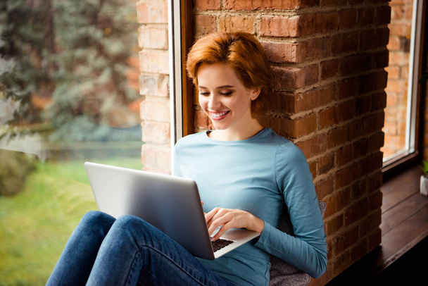 Close up side profile photo beautiful she her lady hands texting notebook foreign friends excited wear blue pullover jeans denim clothes sit comfy big large windowsill house loft living room indoors - Foto, immagini