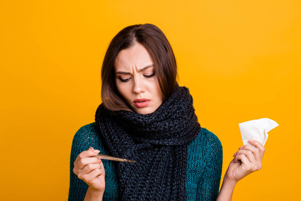 Close up photo beautiful her she lady suffer coughing sneezing medical pneumonia soft scarf around neck napkins hold hand arm thermometer wear green knitted pullover jumper isolated yellow background - Foto, Imagen