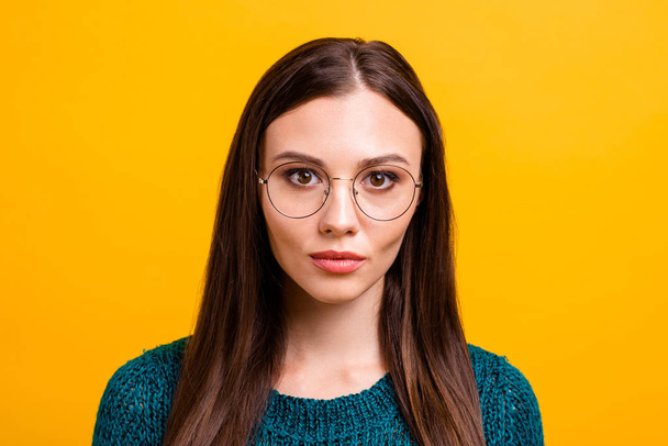 Close up photo beautiful funny funky her she lady long straight hair sincerely kind brown eyes look not smile wear specs casual dark green knitted pullover jumper clothes isolated yellow background - Fotoğraf, Görsel