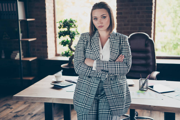 Close up photo beautiful amazing she her business busy lady strict not smiling hands arms crossed glass cup hot beverage stand leaning table office wearing specs formal-wear checkered plaid suit - Φωτογραφία, εικόνα