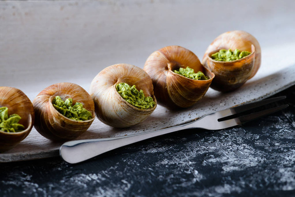 portion of Escargots de Bourgogne or Snails with herbs, view from above - Fotoğraf, Görsel