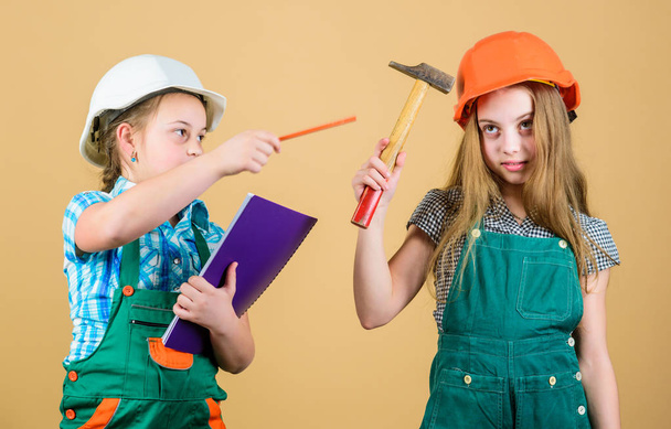 Family remodeling house. Children sisters renovation their room. Control renovation process. Kids happy renovating home. Home improvement activity. Kids girls with tools planning renovation - Foto, Imagem