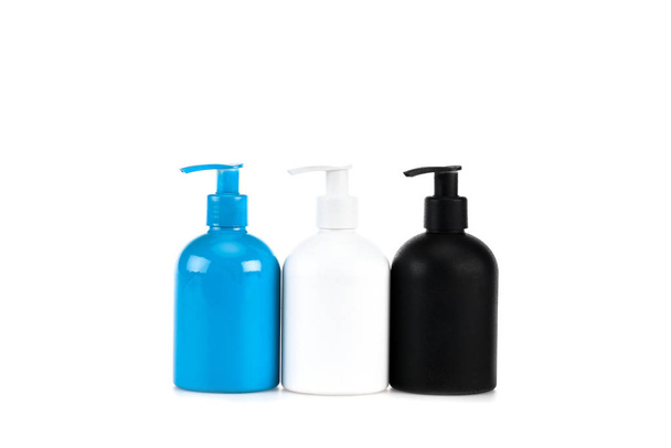 Three cosmetic bottles with sprays isolated on white - Valokuva, kuva