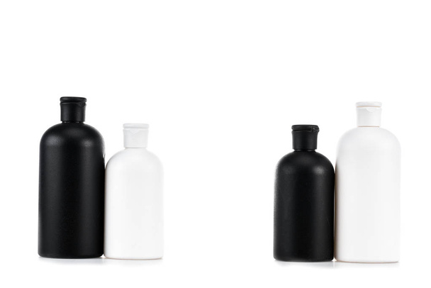 Schwarz-weiße Kosmetikflaschen isoliert auf weiß - Foto, Bild
