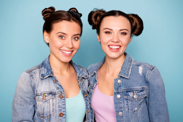 Portrait of cute satisfied pleasant friends isolated hipsters wearing denim clothing on pastel background - Фото, зображення
