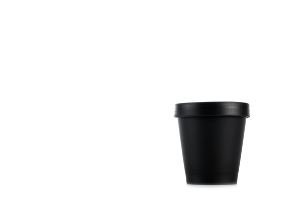 Black plastic cup isolated on white with copy space - Photo, Image