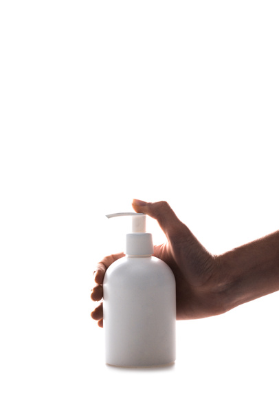 Vista cortada da mulher usando frasco de spray cosmético isolado em branco
 - Foto, Imagem