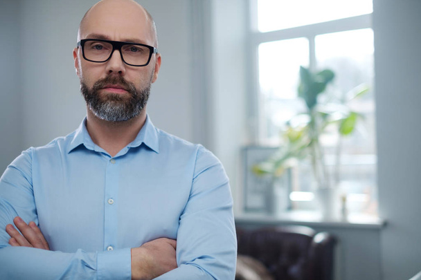Bearded middle-aged man wearing glasses. - Fotoğraf, Görsel