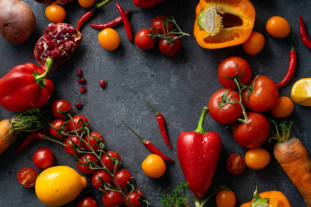 pile of fresh colorful vegetables on concrete grey background, Healthy food ingredients concept - Fotó, kép
