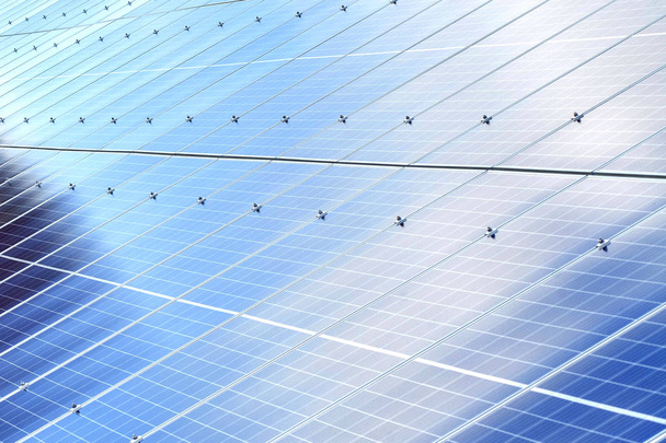 Solar panels background. Photovoltaic renewable energy source - Фото, изображение