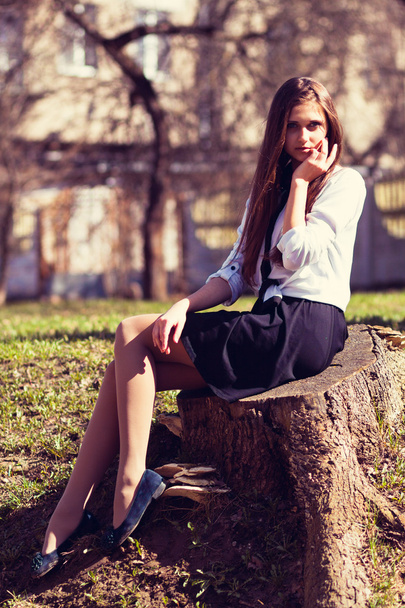 Beautiful girl sitting - Valokuva, kuva