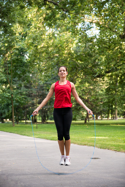 Workout with skipping rope - Foto, afbeelding