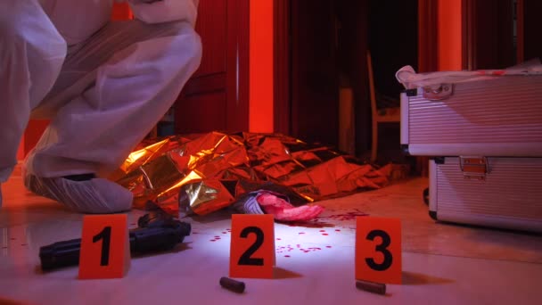 Scientific Police takes evidence in crime scene, conceptual video - Video, Çekim