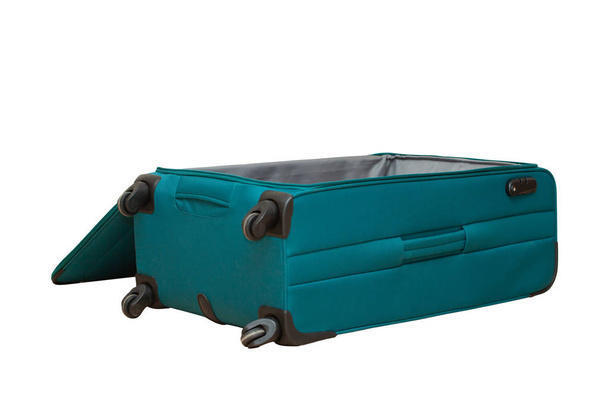 Открытый чемодан для путешествий на белом фоне
 - Фото, изображение