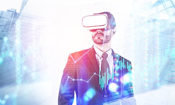 Man in VR headset in city, virtual graph - Photo, image
