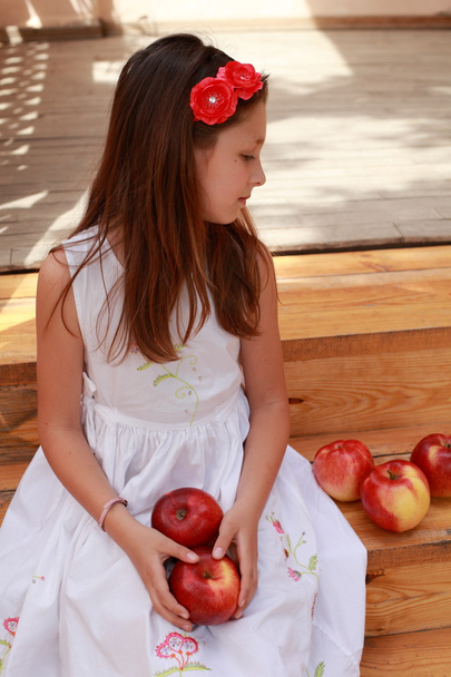 Girls with apples on the stairs - Photo, Image