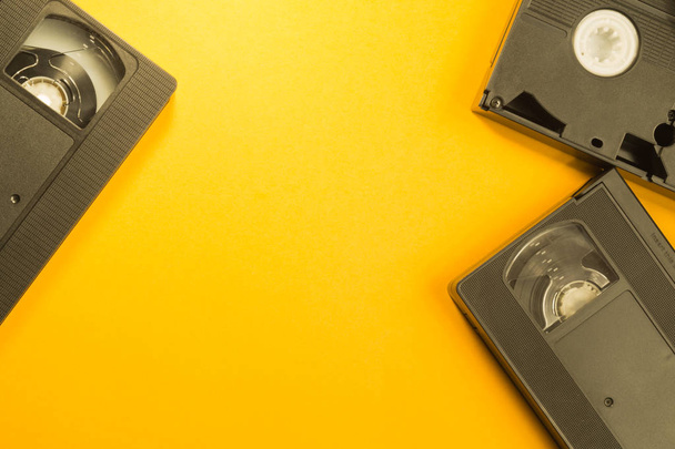 video tape isolated on yellow background - 写真・画像