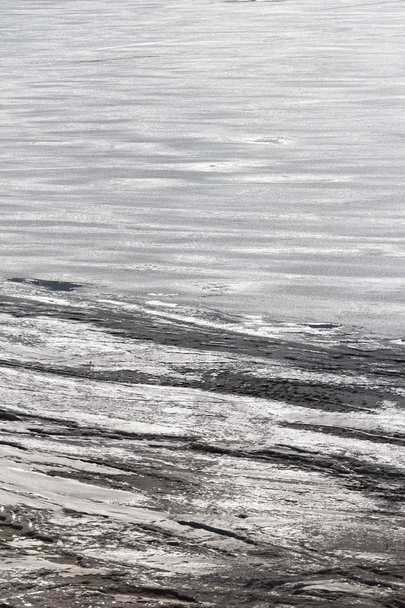 The shore of a frozen river - Φωτογραφία, εικόνα