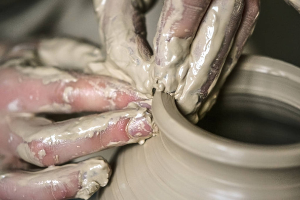 hands in the clay macro - Photo, Image