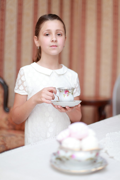 Beautiful little girls with tea - Foto, Imagen