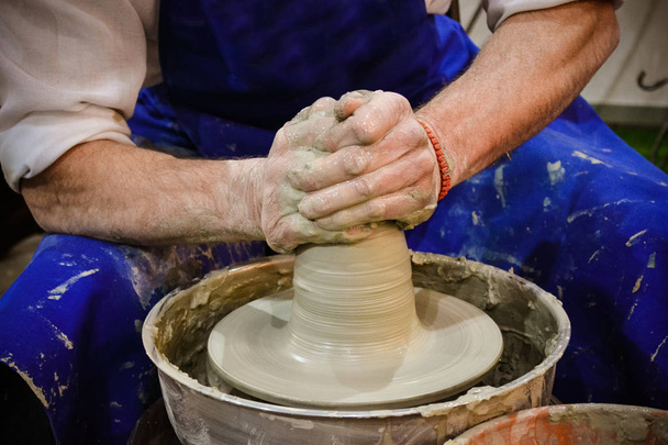 The potter molds clay jug pot closeup - Photo, Image
