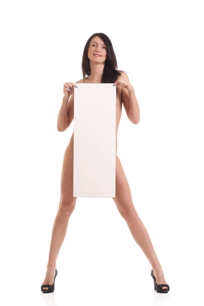 Sexy young woman posing in bikini showing blank placard board - Foto, Imagen