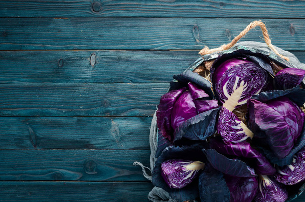Purple cabbage in a wooden box. Organic food. Top view. Free space for your text. - Fotografie, Obrázek