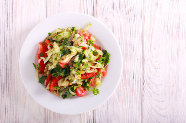 Fresh vegetable salad with cucumber, tomato  - Zdjęcie, obraz
