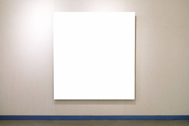 blank picture frame on exhibition wall - Photo, Image