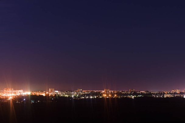 Long exposure night photo. A lot of stars with trees on foreground. Far from the city. Night landscape. - Foto, Imagem