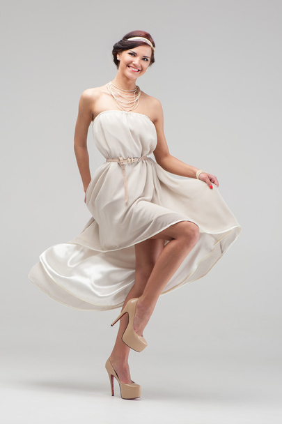 Girl in white evening dress - Foto, Imagen