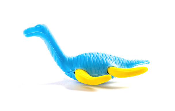 beyaz bir arka planda kauçuk plesiosaurus oyuncak - Fotoğraf, Görsel