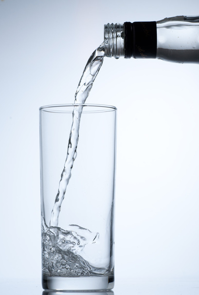 Glass with pouring water - Photo, Image