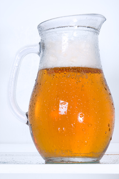 Dewy pitcher of beer in the fridge - 写真・画像