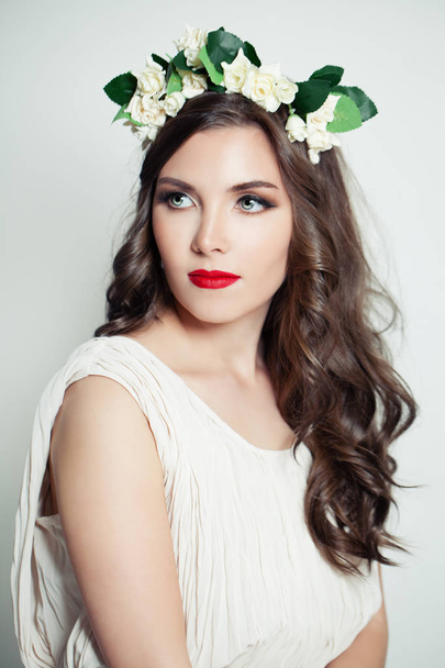 Beauty portrait of elegant model in flower crown - 写真・画像