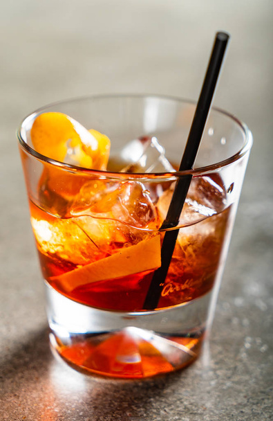 tasty alcoholic old fashioned cocktail in the bar - 写真・画像