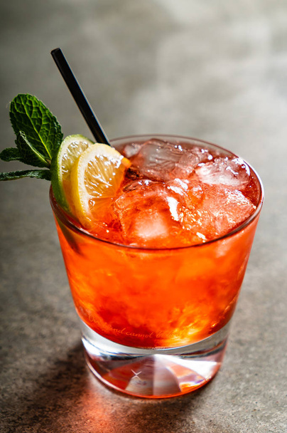 tasty alcoholic old fashioned cocktail in the bar - Фото, зображення