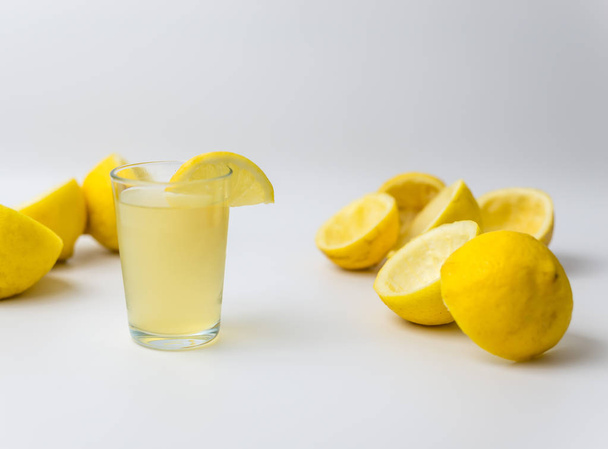 Squeezed lemon peels after making a fresh juice  - Foto, afbeelding