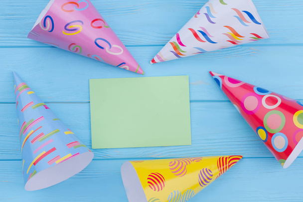 Patterned party hats and blank paper card. - Photo, Image