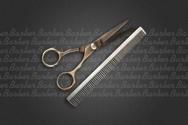 Hairdressing scissors and a hairbrush on a dark background. Barber Shop background. Copy space. Beauty and fashion background. - Photo, Image