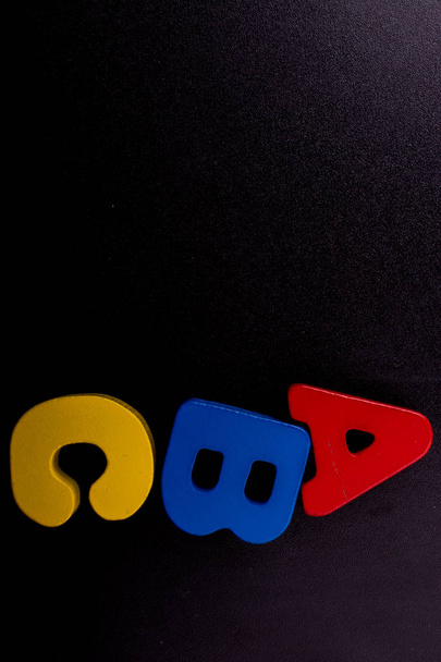 Fából készült színes Abc betűk  - Fotó, kép
