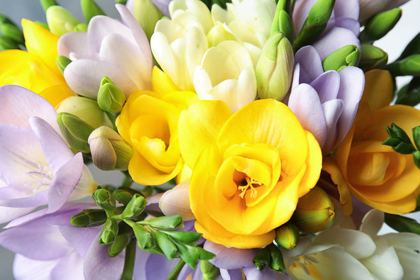 Beautiful bouquet of fresh freesia flowers as background, closeup - Fotografie, Obrázek