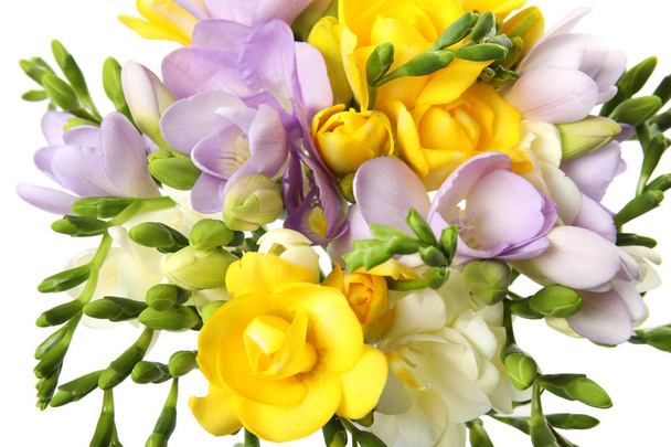 Bouquet of fresh freesia flowers on white background, top view - Foto, Imagem