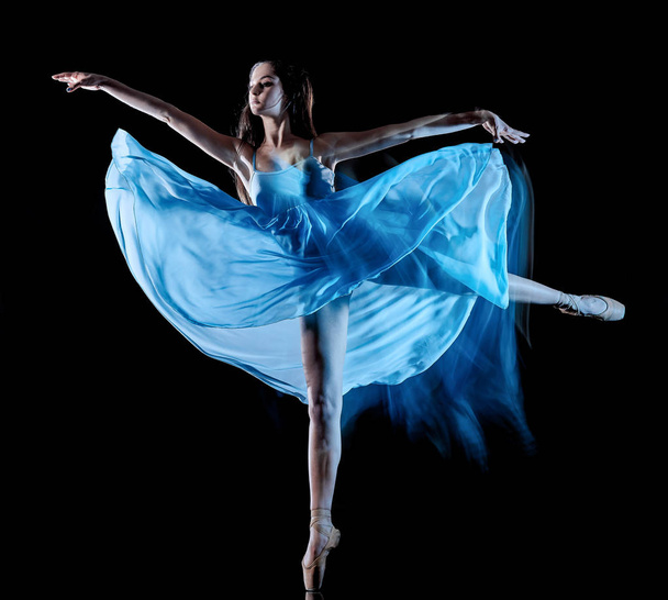 young woman ballet dancer dancing isolated black background light painting - Fotoğraf, Görsel